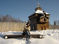 Man sitting in front of Russian fort in Siberia, Irkutsk